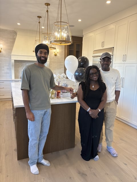 Key handover — luxury custom home by Bright Custom Homes, Rocky Ridge